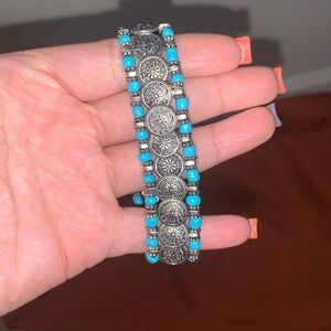 Park Lane Australian crystals with silver and blue coloring.